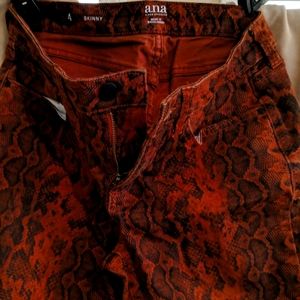 Snakeskin skinny jeans